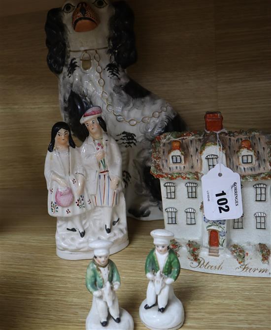 A small group of Staffordshire figures including a Potash farm model tallest 32cm